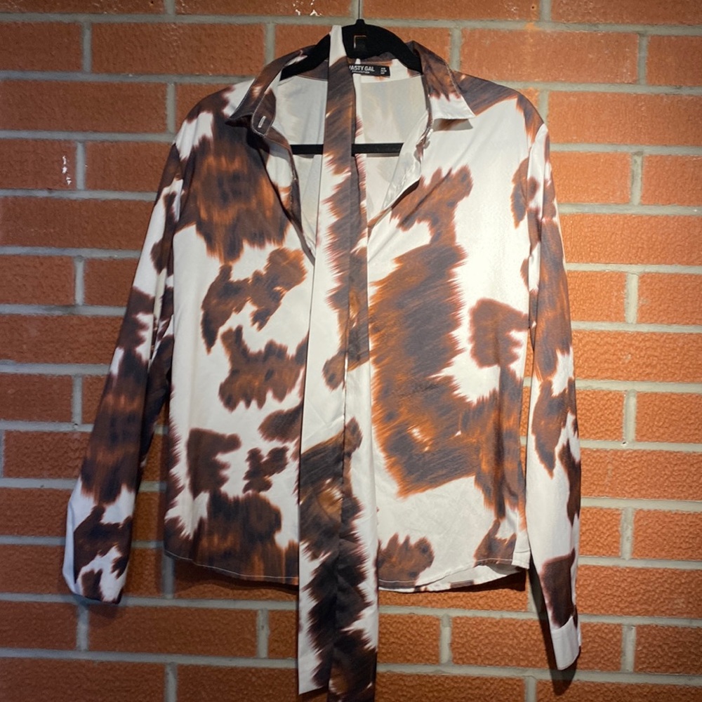 Nasty Gal cow print blouse with tie.